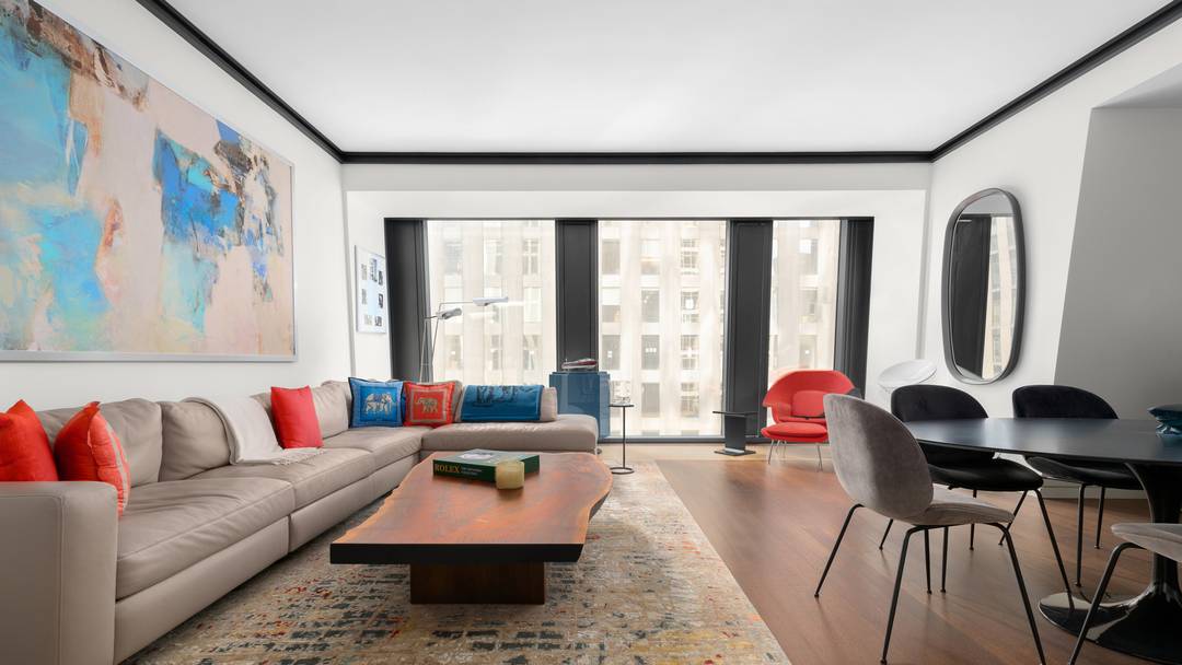 Welcome to Residence 21E at 53 West 53rd Street, a high floor 1 bedroom, 1.