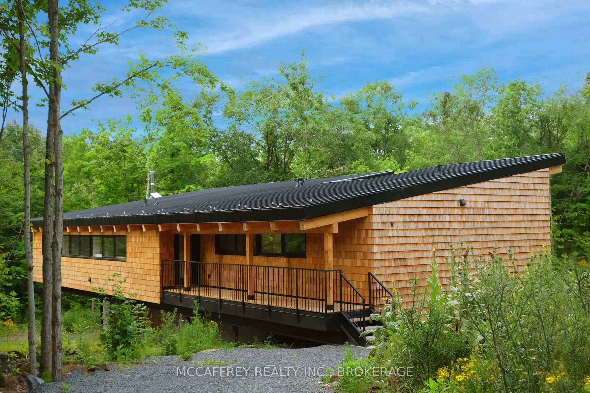 Welcome to this beautifully designed, newly built 2024 4 bedroom, 2 bathroom home nestled in a serene, wooded setting.