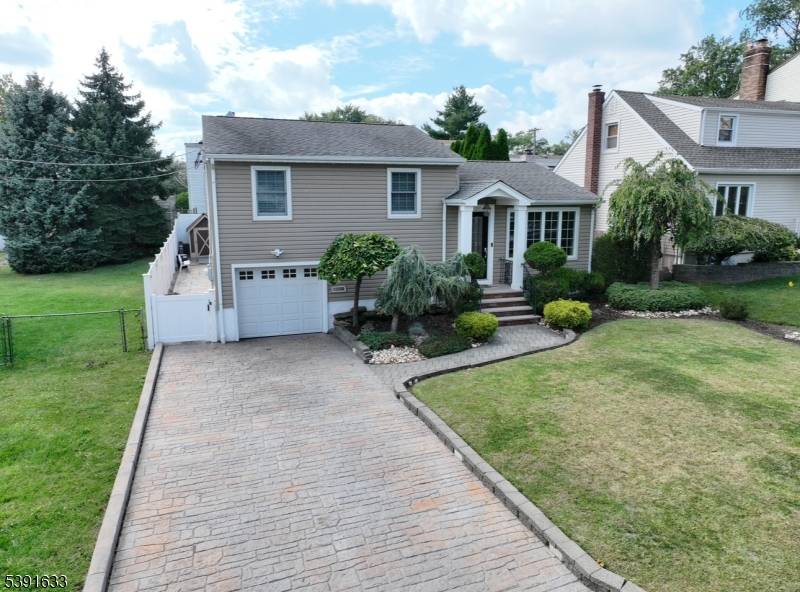 Less than 10 min. walk to the train to NYC, this meticulously maintained home offers the perfect blend of comfort, convenience, and style.