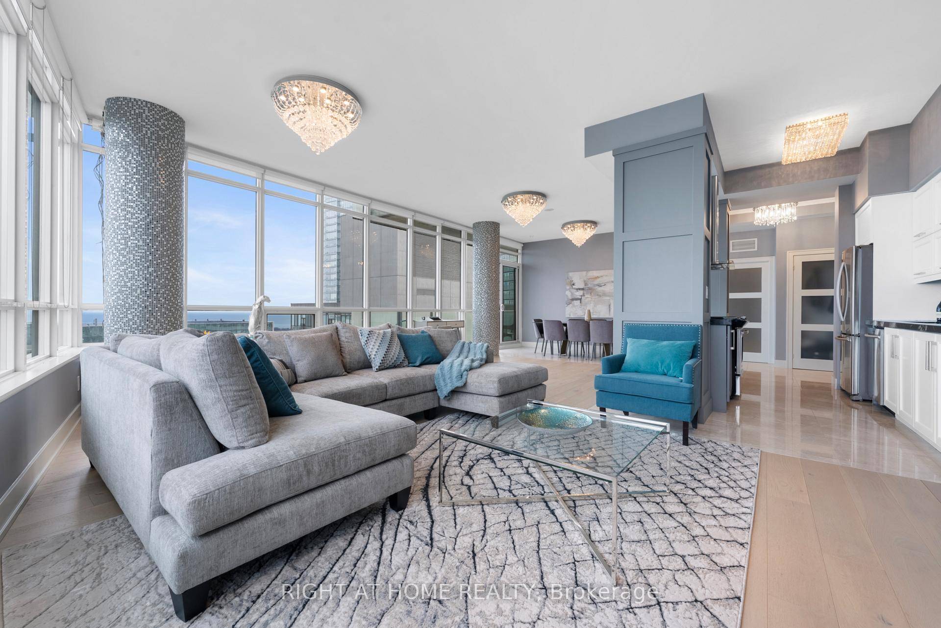 Exquisite Penthouse Living with Panoramic Lake Views.