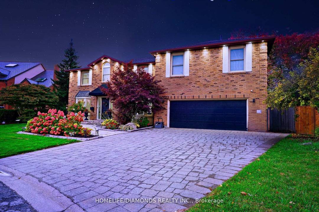 Welcome to 47 Ridge Point Drive where luxury meets the skyline.