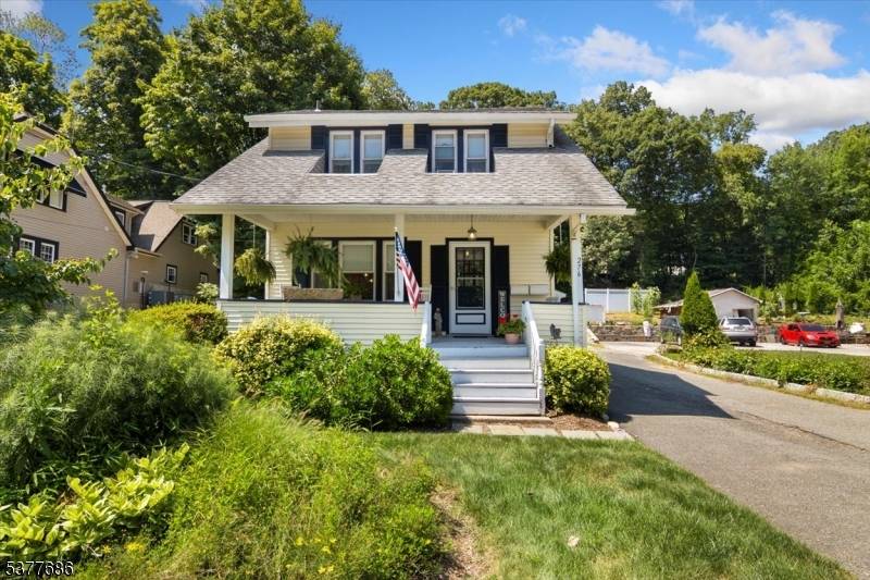 Step back in time with this remarkable home, owned by the original proprietor of Grandma's Attic.