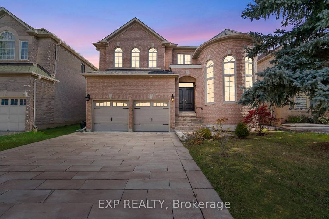 Beautifully upgraded executive 4 bedroom, 5 bathroom detached home situated on a premium 50' x 193' lot in the prestigious Bayview Hill community.
