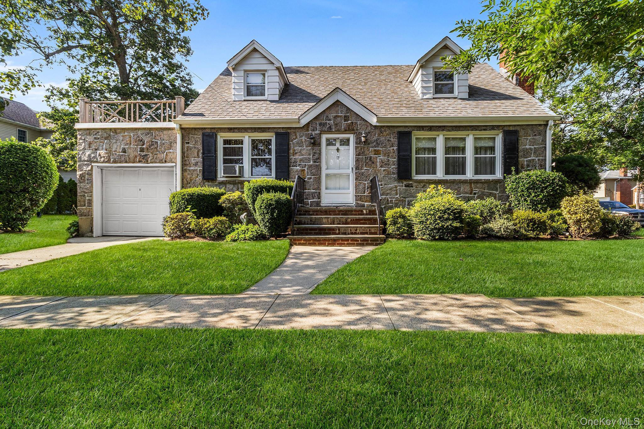 Charming home situated on a desirable corner lot featuring a 1 car attached garage and inviting living room with a cozy fireplace.