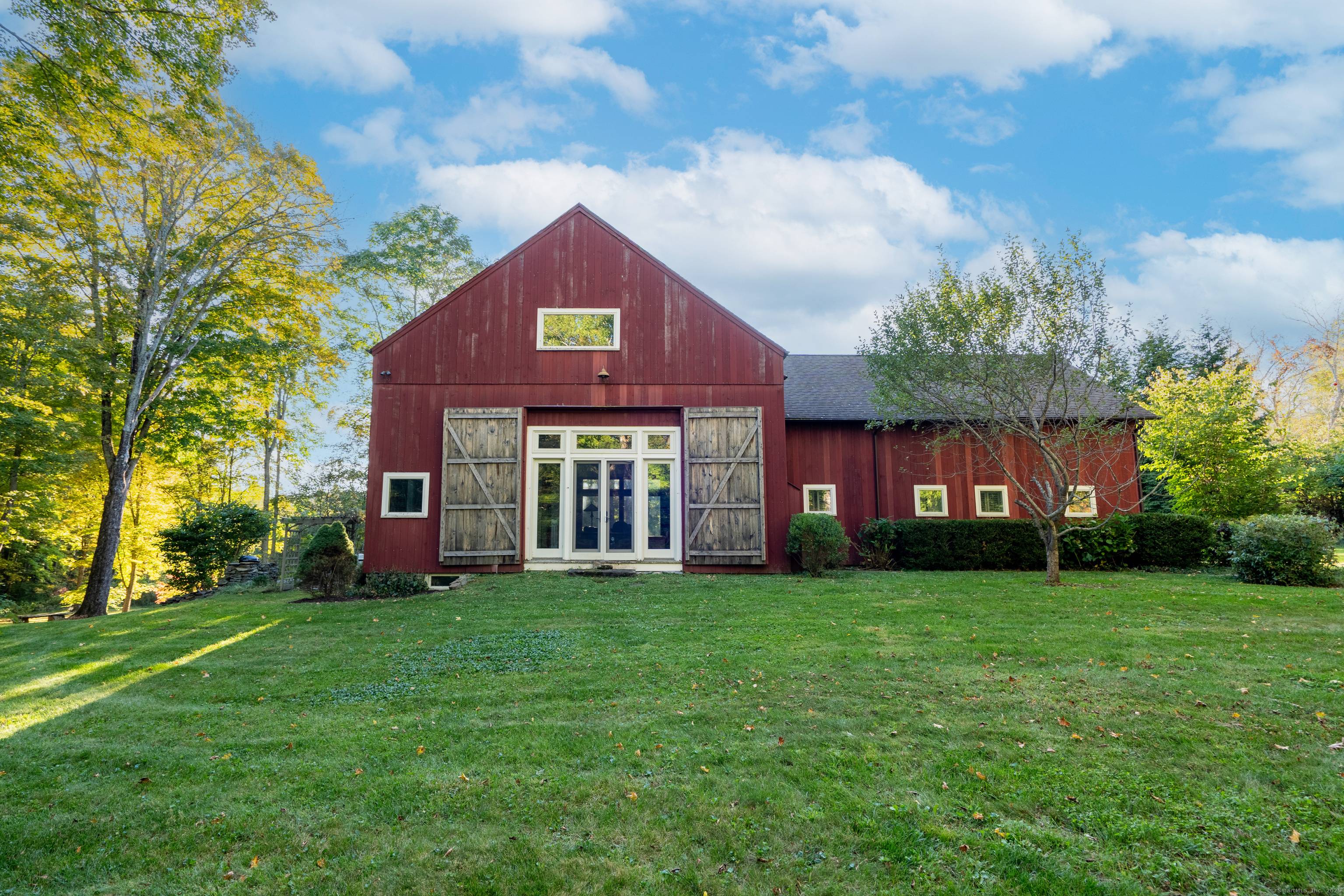 This historic c. 1865 post and beam barn has been meticulously crafted into an incredibly handsome home by master Housewright H.