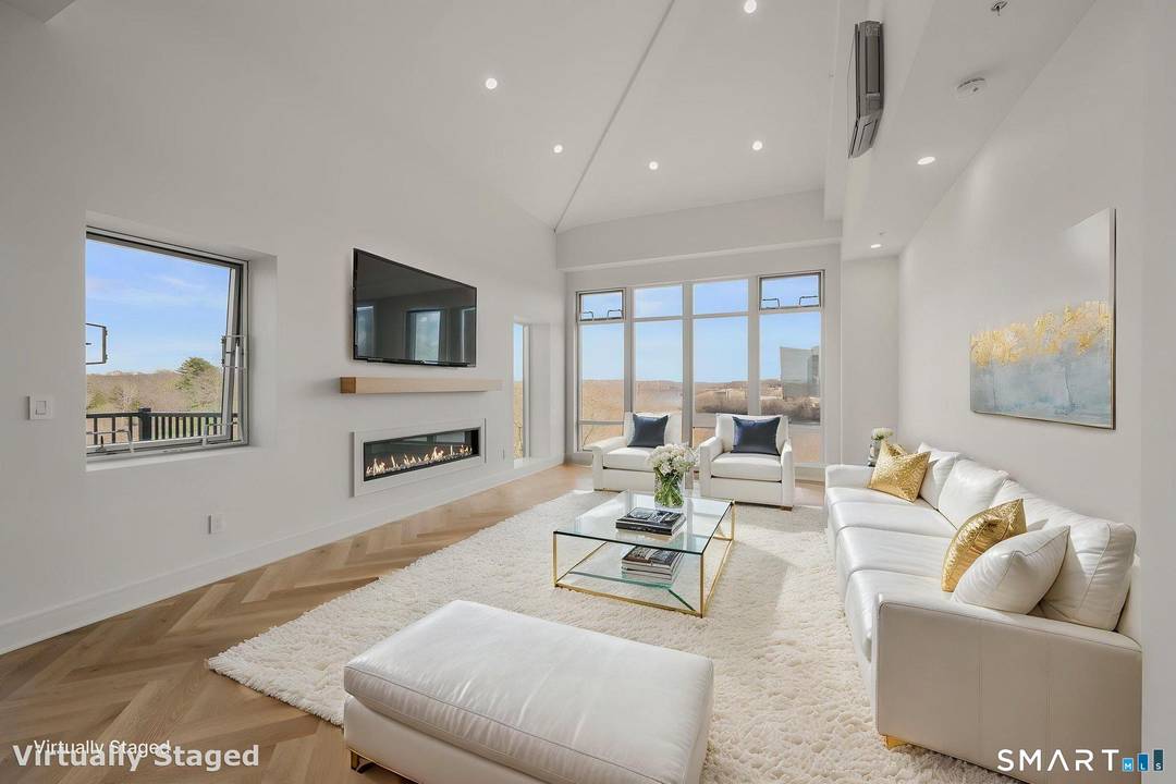 Welcome to modern luxury living at 586 W Thames St, offering high end finishes, water views, and unbeatable convenience to casinos, highways, and local amenities.