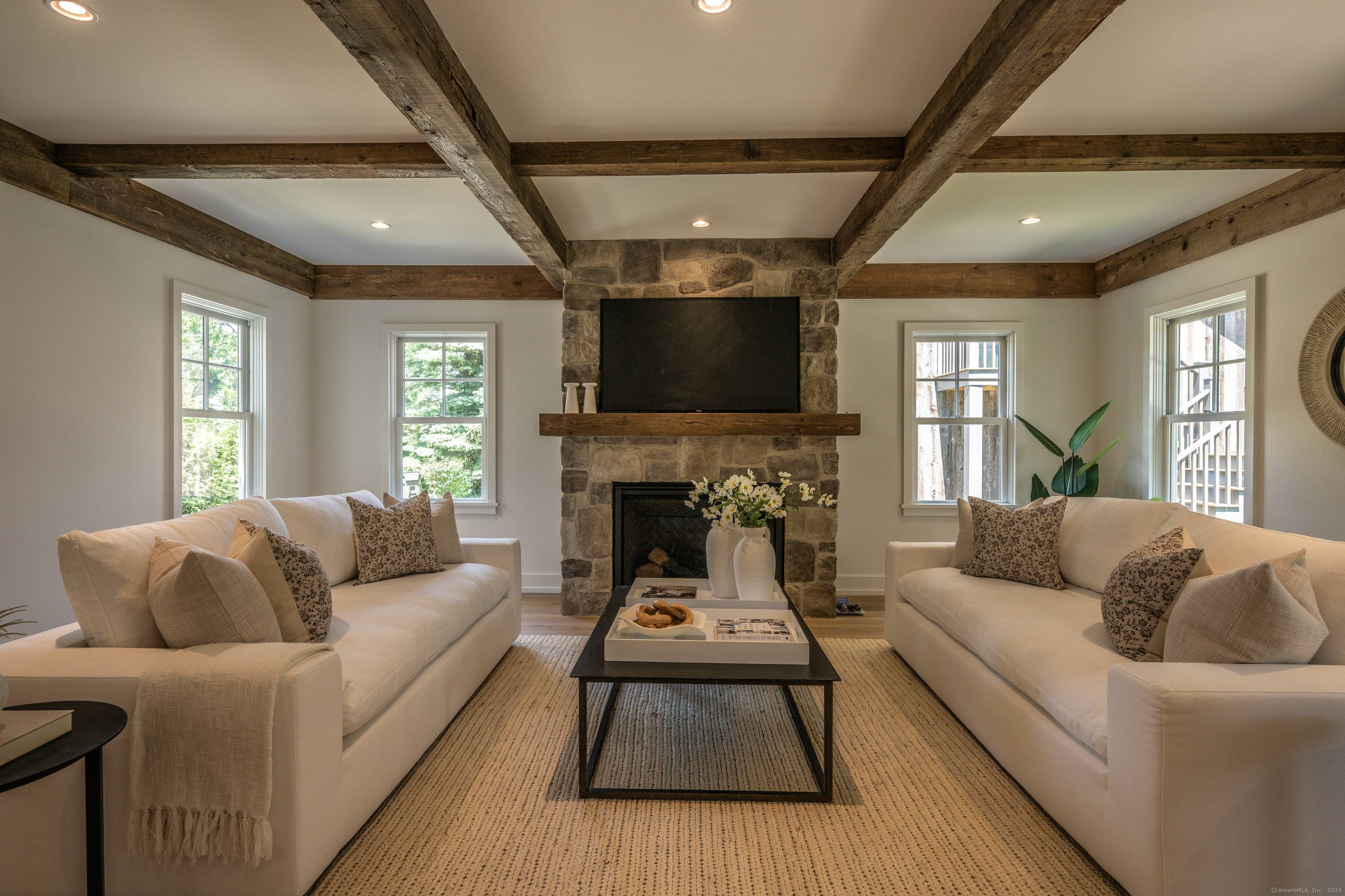 A masterful reinvention by Michael Greenberg of a historic 1894 Victorian Farmhouse, 26 Treadwell Avenue is a rare blend of old world character and modern luxury.