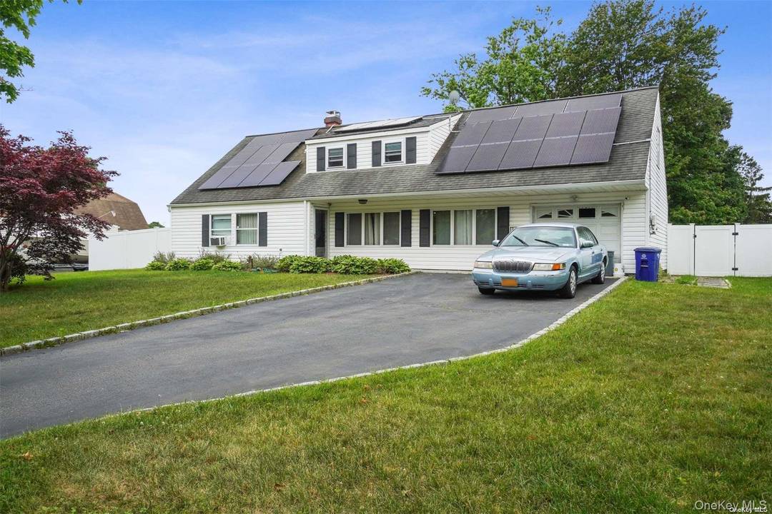 Welcome to 64 Pitchpine Place, a beautifully maintained Cape style home offering the perfect blend of charm, space, and modern convenience.