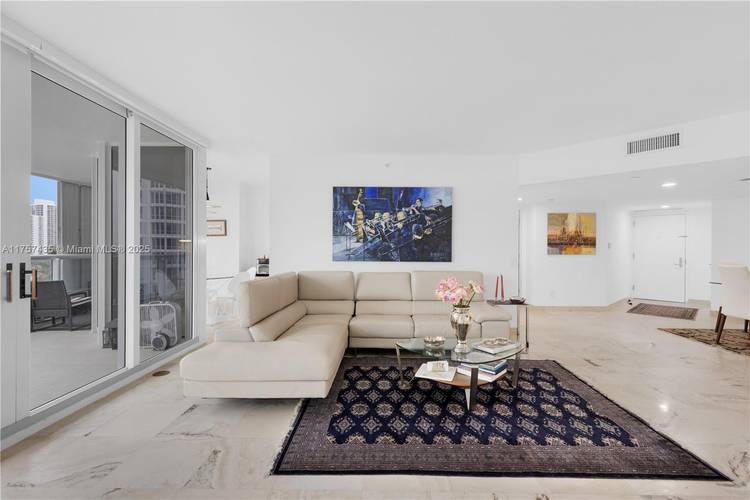 BEAUTIFUL 3 BEDROOM 2 BATH OR 2 DEN CORNER UNIT IN ONE OF THE BEST BUILDINGS IN AVENTURA.