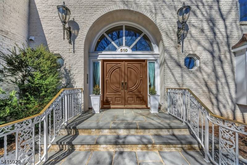 Rarely does a residence of this caliber offering a true 1st floor primary wing and artisan quality Ulrich spa bath become available in such a coveted Franklin Lakes location.