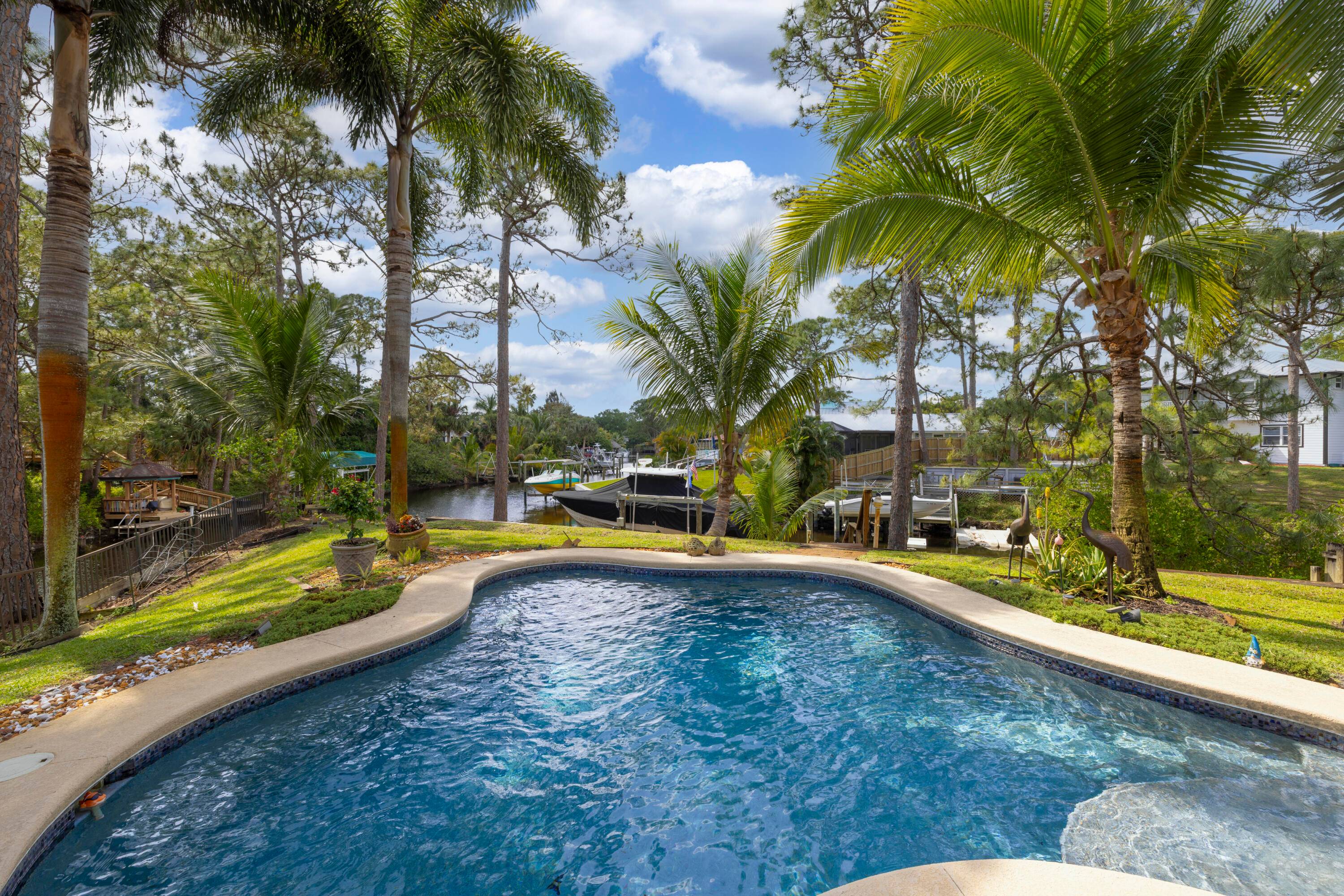 Waterfront Paradise with Ocean Access A Rare Find !