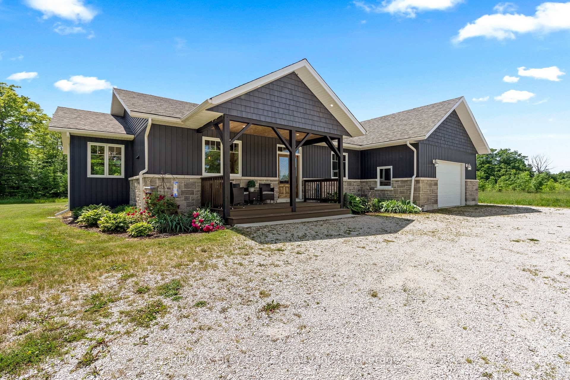 Welcome to 1379 West Road, a thoughtfully designed custom home built in 2019, set on a private 2.