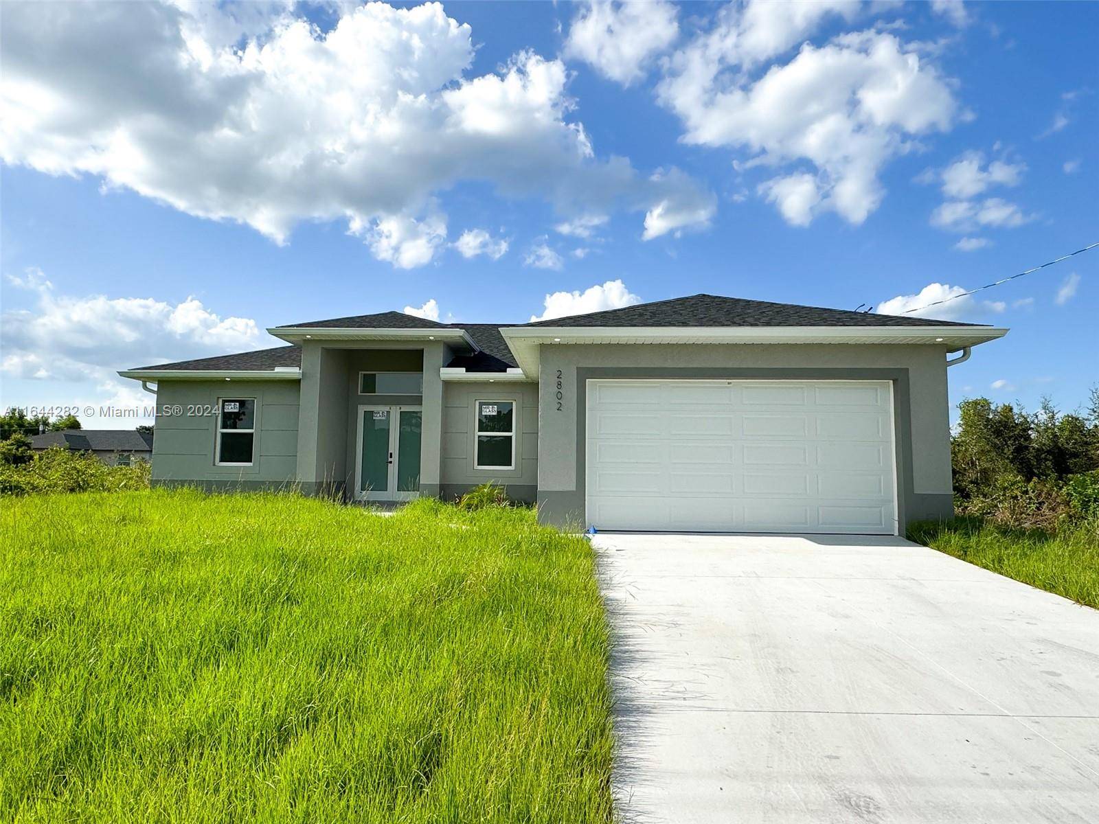 Beautiful New Construction in the best location in Lehigh Acres, near Sunshine Blvd and Lee Blvd.