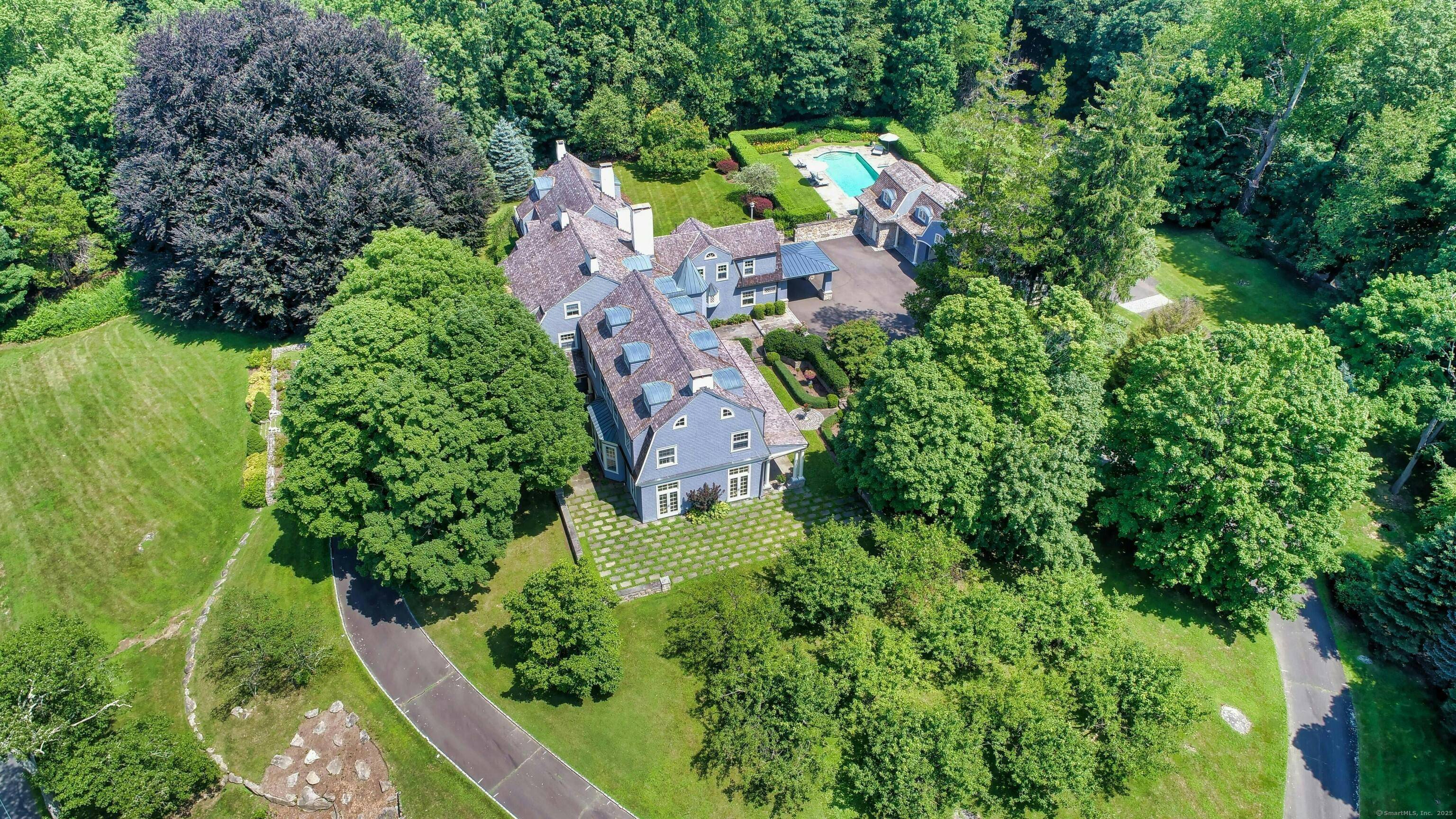 HOMEWOOD This remarkable country compound is one of the precious few 18th 19th century shingle style colonial revival estates remaining in Fairfield Cty.