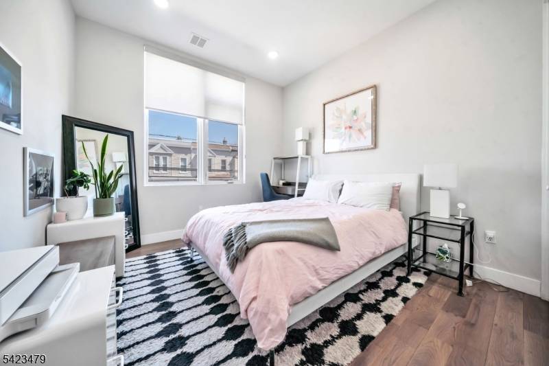 Luxury townhouse style condo offering the perfect blend of space, style, and location in Jersey City Heights.