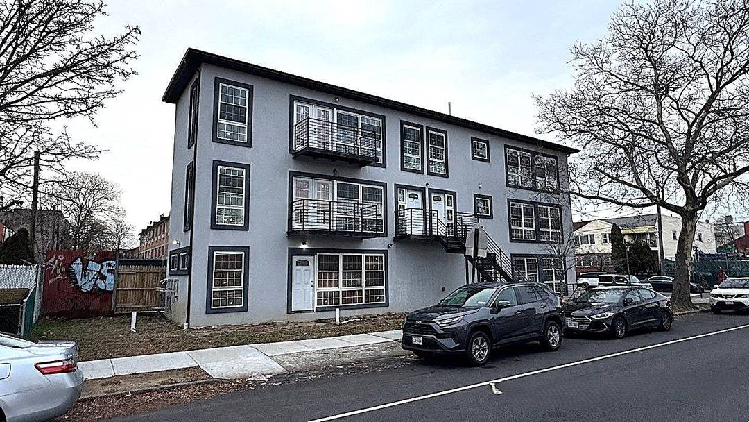 Magnificent structure destined to be a 3 Family home, being sold in its current state as incomplete New Construction, having much of the work already completed but in need of ...