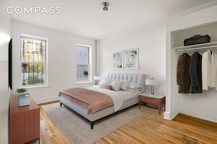 1437 Lincoln Place, a gracious early 20th century barrel front townhouse, blends timeless prewar character with over 3, 000 square feet of flexible living space across three full floors.