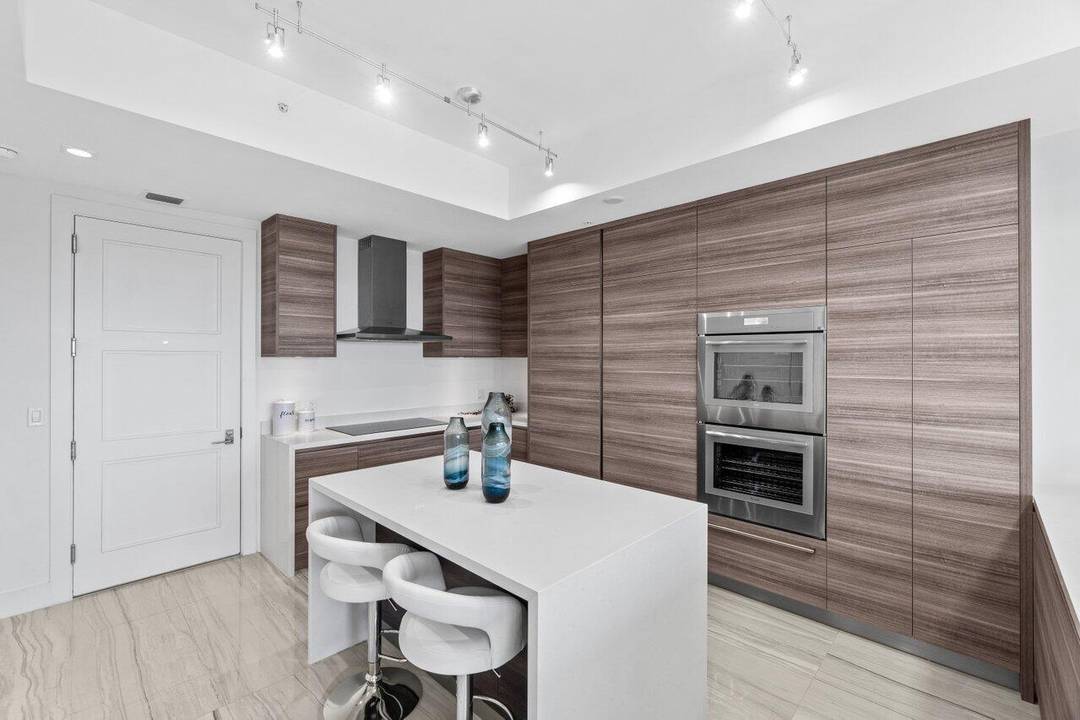 Experience luxury living at its finest in this breathtaking 12th floor penthouse located in the heart of East Boca.