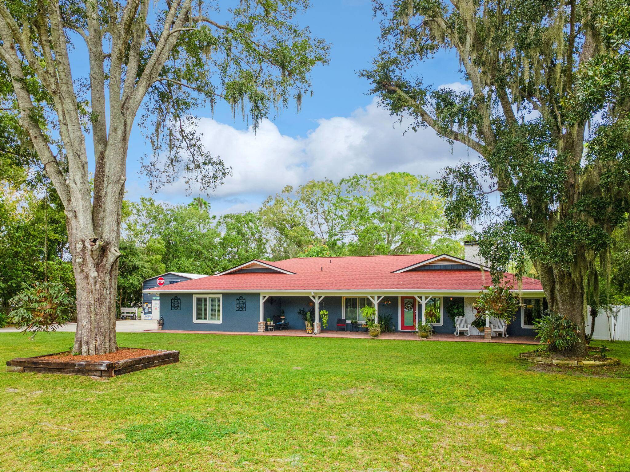 Welcome to your private country estate on nearly 3 acres !