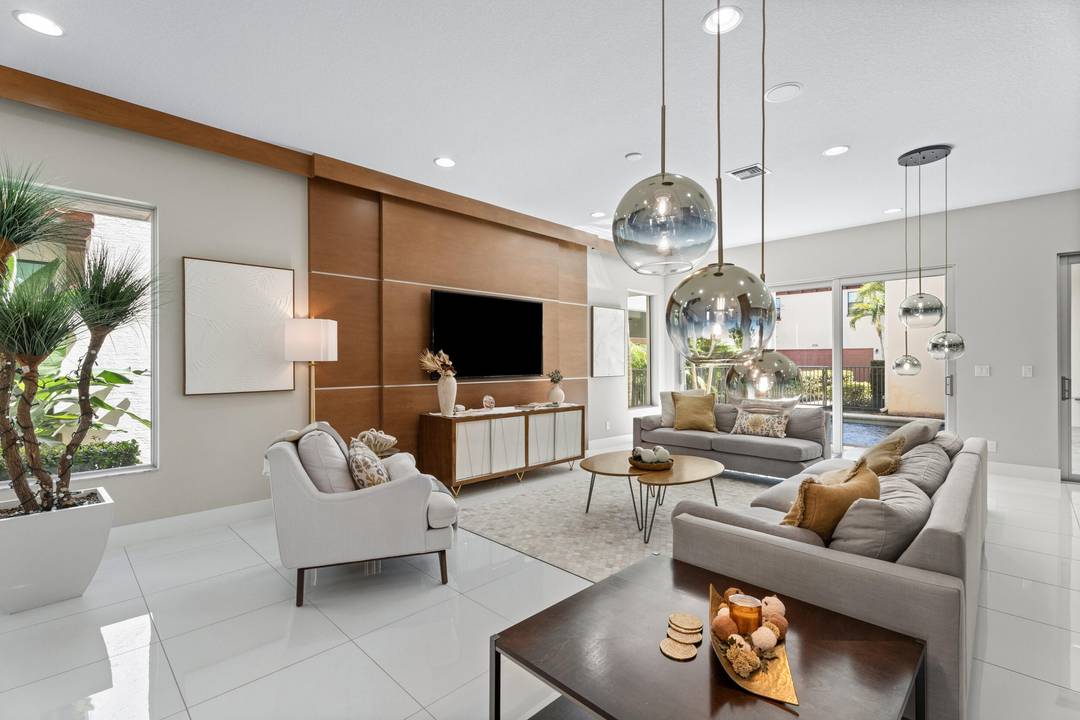 Located in the highly desirable Alton community of Palm Beach Gardens, this professionally designed Manchester Model home offers 3, 849 square feet of living space including 4 bedrooms, a den, ...