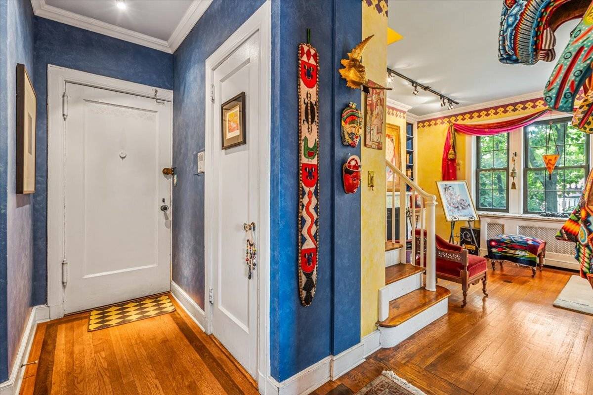 Discover this charming three bedroom, 21 2 bath duplex nestled in a century old neighborhood, often described as an urban antidote to Manhattan s dense chaos.