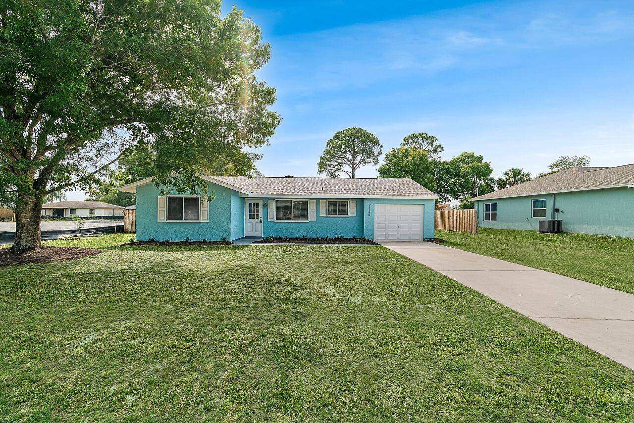 Beautiful remodel of this 3 2 1 home on a pretty street !