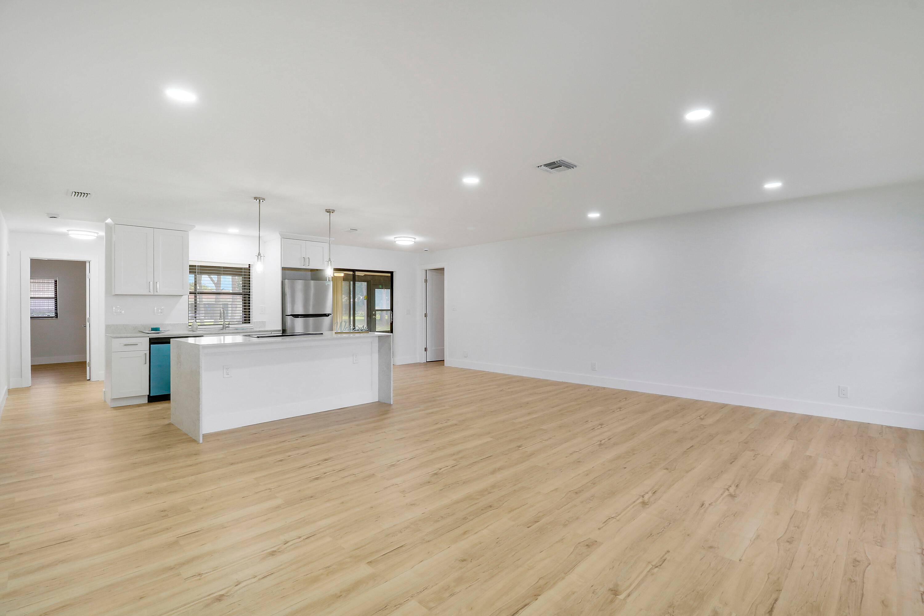 This beautiful fully renovated lake front home sits on one of the largest lots in the community.