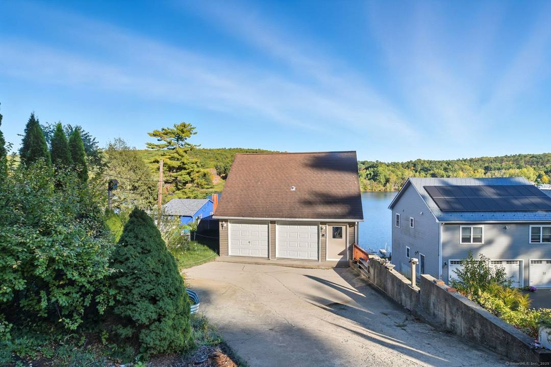 Experience the beauty of lakefront living on Staffordville Lake, where comfort, craftsmanship, and panoramic water views come together in perfect harmony.