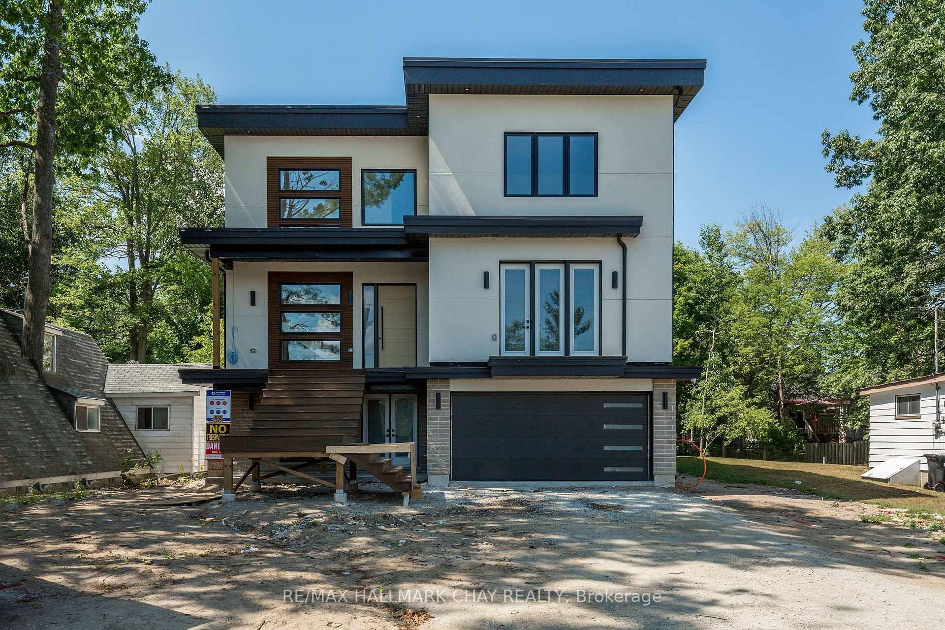 This unit is in a brand new, never lived in luxury triplex featuring 2 spacious bedrooms, 1 bath, and impressive high ceilings that enhance the abundant natural light streaming through ...