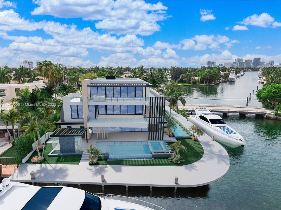 Set on a coveted point lot in the exclusive Harbor Beach enclave, this modern estate represents a premium tier of renowned luxury.