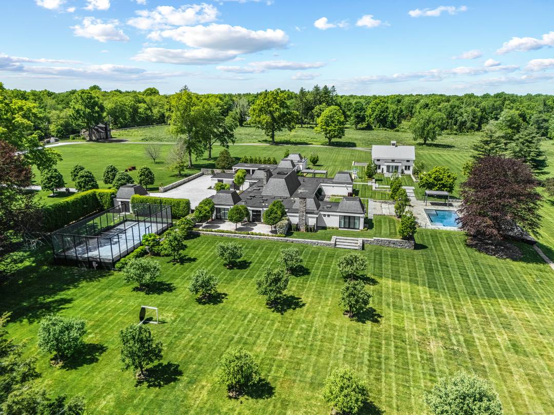 This offering is for 4800 Congress St, a one of a kind estate consists of main residence on 10.