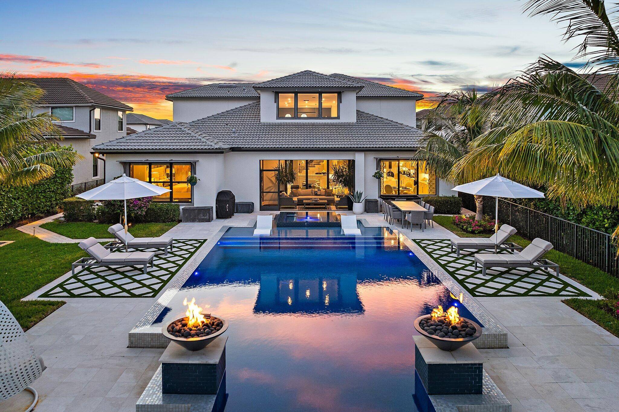 Welcome to your new move in ready designer home in the heart of Jupiter's premier gated and family friendly community of Sonoma Isles.