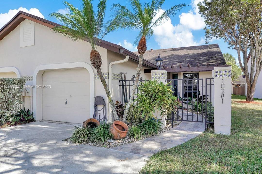 Welcome to this fully updated corner townhome in the desirable Valencia community in the heart of Kendall.