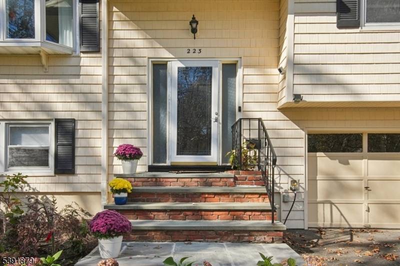 Tremendous high end renovation with tasteful modern finishes including open kitchen to dining living area.
