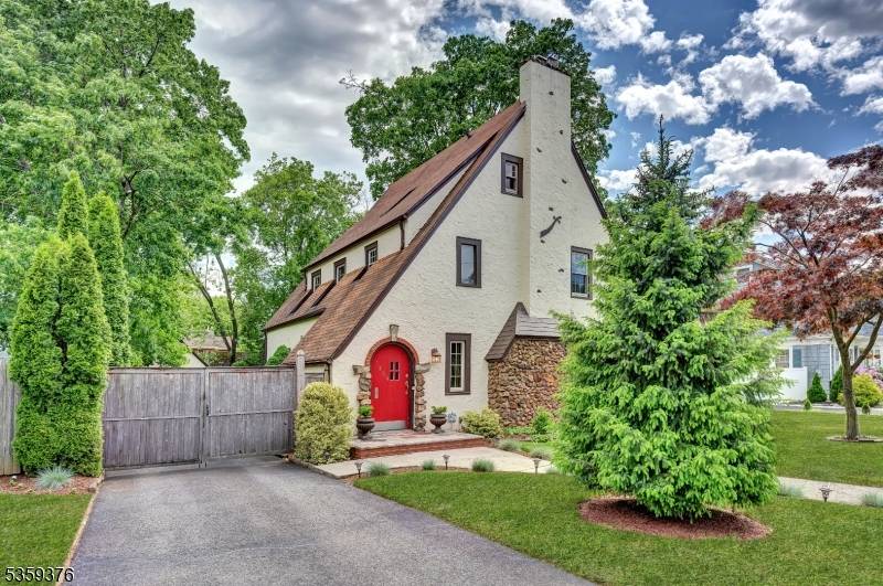 Welcome to this stunning four bedroom, two full bath, and one half bath classic Tudor style home located in one of Plainfield's most desirable East end neighborhoods.