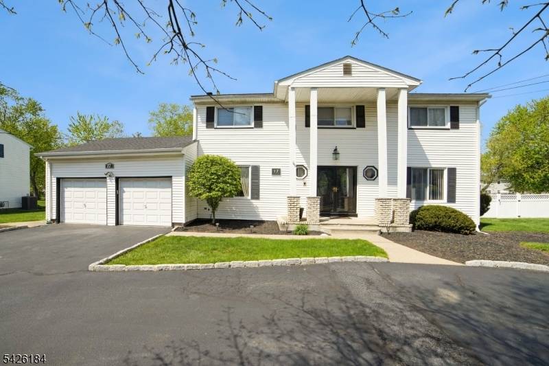 Picture perfect Center Hall Colonial located in the heart of Parsippany Troy Hills.