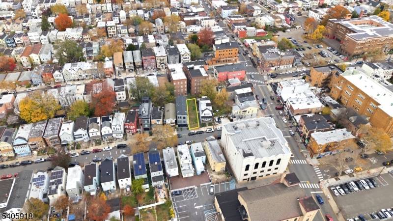 Buildable lot located in Jersey City's West Bergen area with zoning that allows for condominium or multifamily development and an approved accessory dwelling unit.