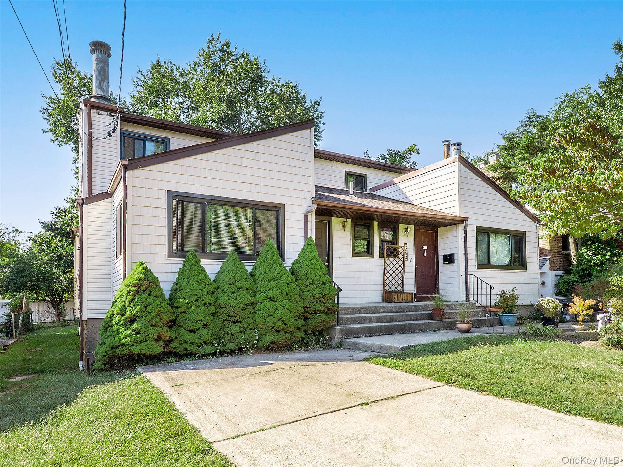 This well maintained two family side by side duplex, built in 1983, is ideally located on a quiet street in Port Washington.
