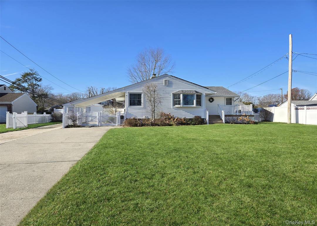 Welcome Home ! Here we have a lovely 3 bed 2 bath ranch in the heart of Centereach.