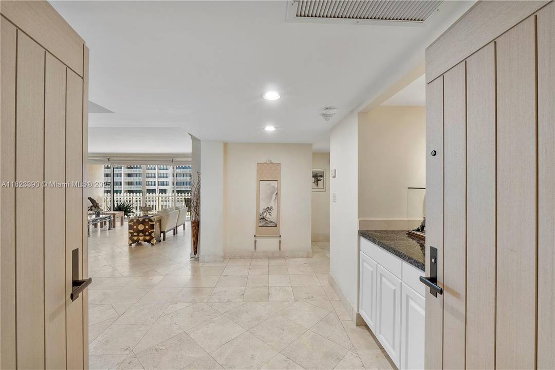 Experience luxury waterfront living in this spacious 2 bedroom, 2 bathroom residence at Grove Isle in Coconut Grove.