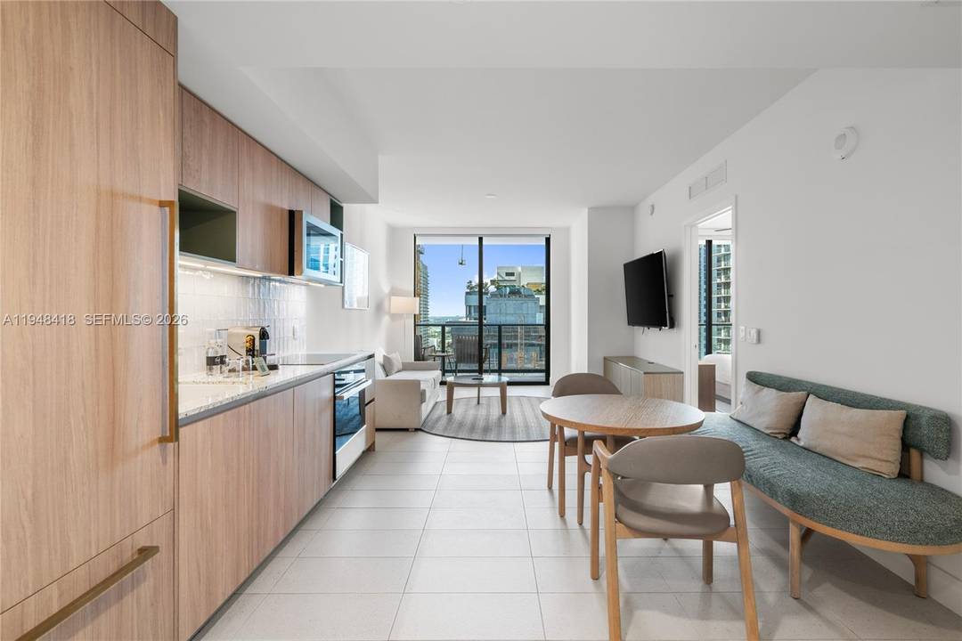 Bright and fully furnished 1 bedroom, 1 bath residence on a high 28th floor at Gale Miami Hotel amp ; Residences, offering open skyline and downtown views.