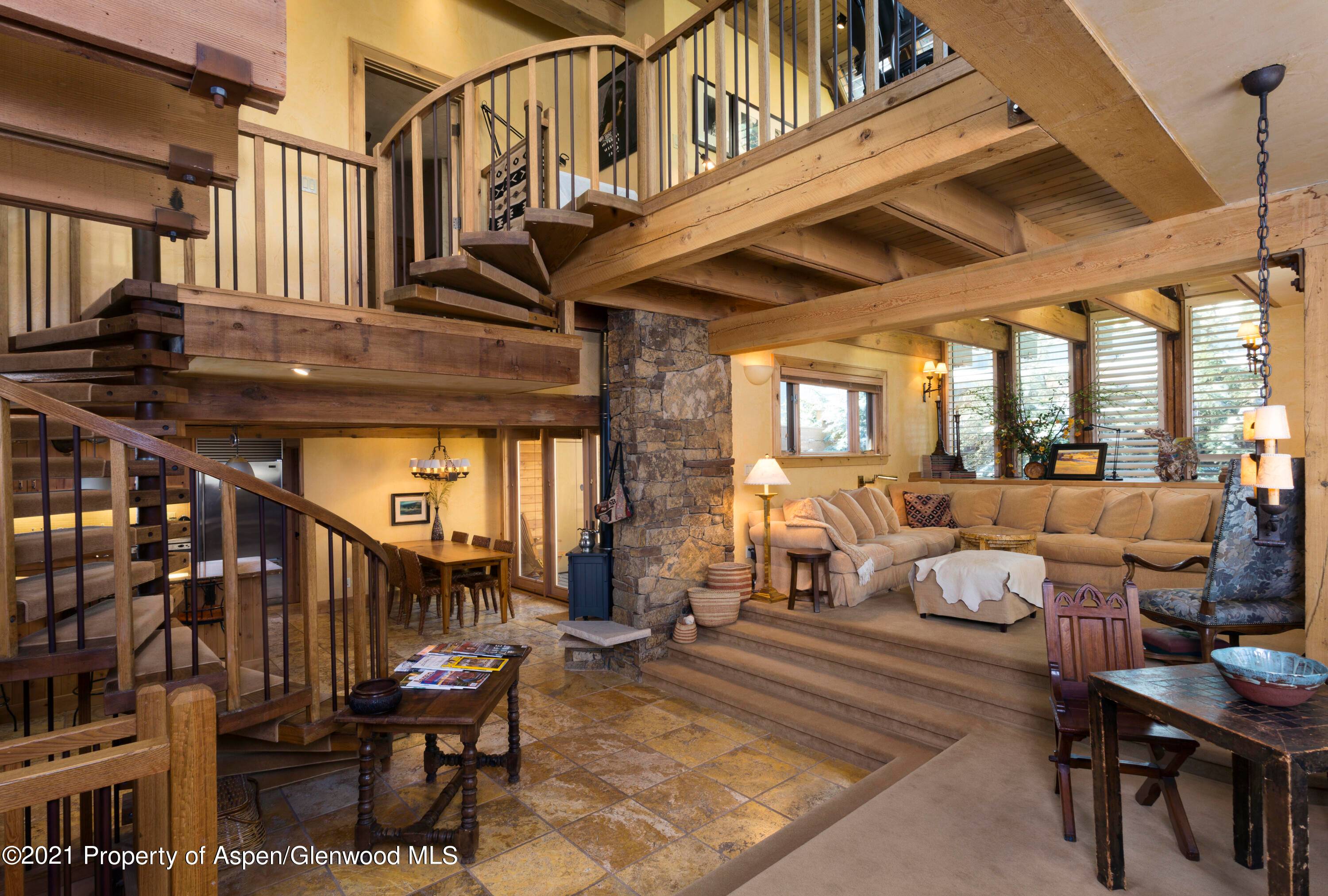 This three bedroom plus den, three and a half bathroom half duplex offers over 3, 600 square feet of living space spread over three levels.