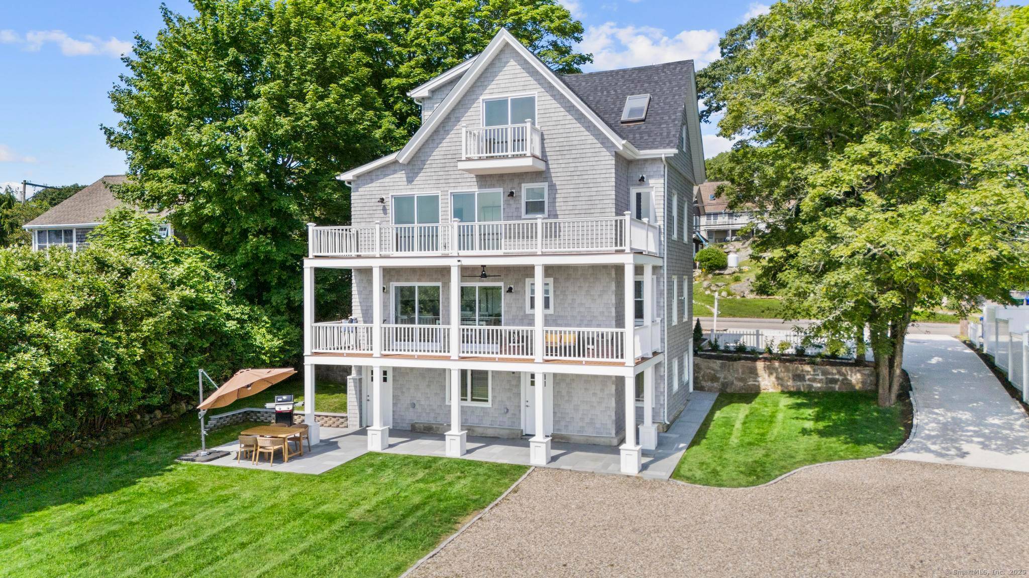 Welcome to this stunning, completely remodeled WATERFRONT two family home where no detail has been overlooked.