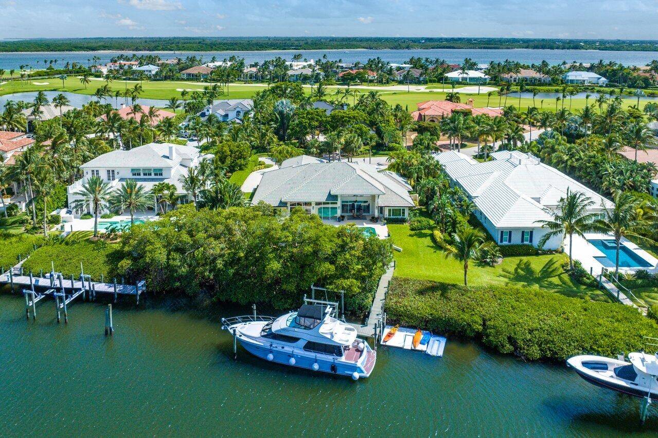 This remarkable four bedroom waterfront residence in Sailfish Point is the epitome of luxury living.