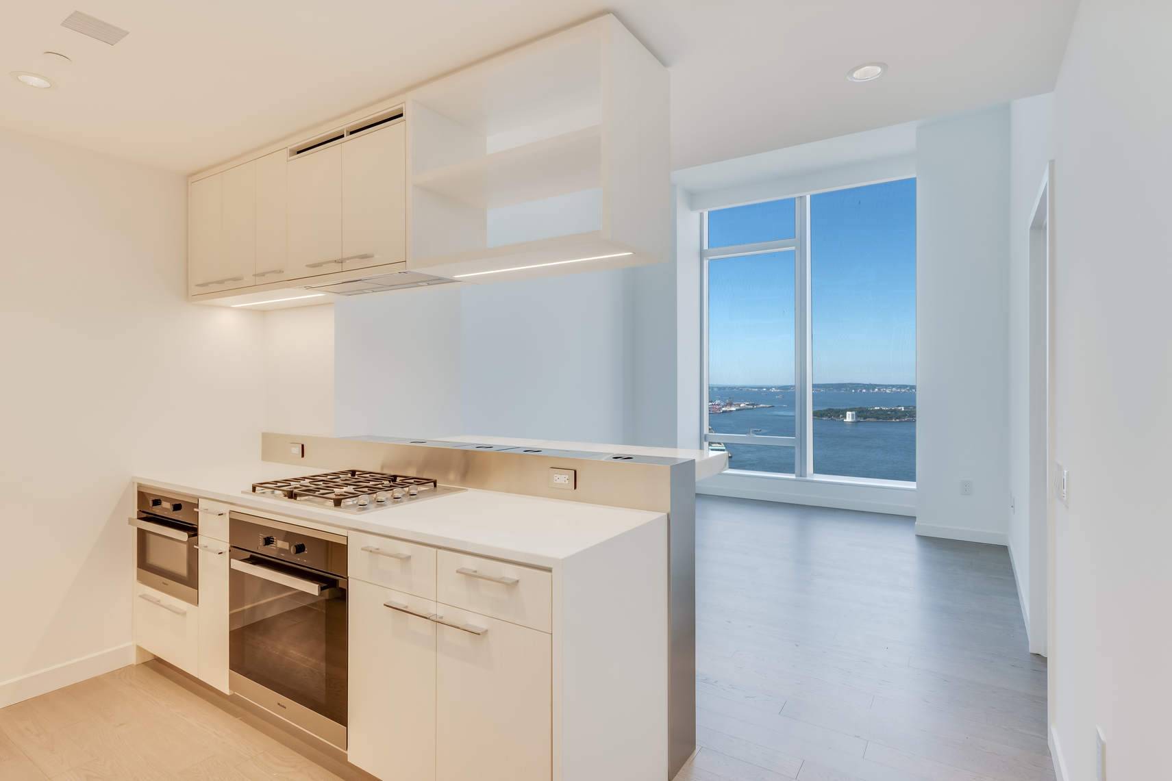 Own a slice of the Manhattan sky in this loft like apartment at One Manhattan Square.