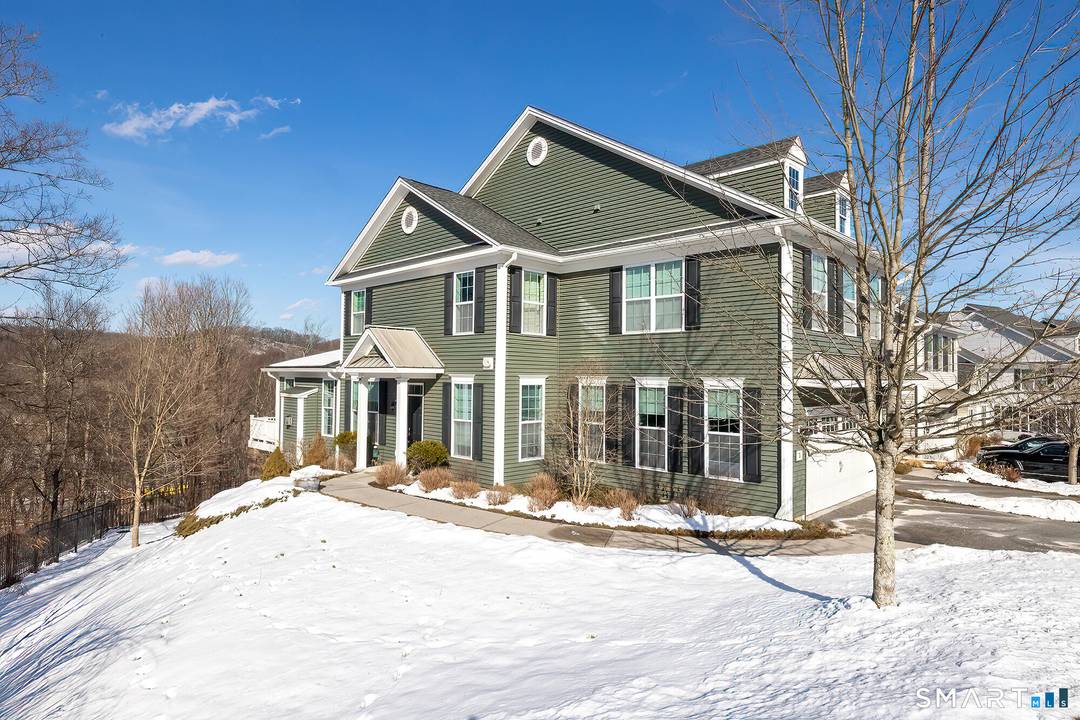 The Hills At Rivington This meticulously maintained 3 bedroom, 4 bath colonial style condo by Toll Brothers features premium upgrades and stunning westerly sunset views from an oversized deck.