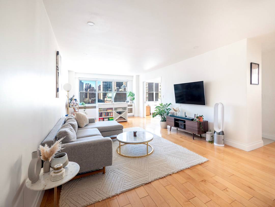 Welcome home to this beautifully renovated, sun filled corner two bedroom residence with open city views, located in the highly sought after N line at 300 East 71st Street.