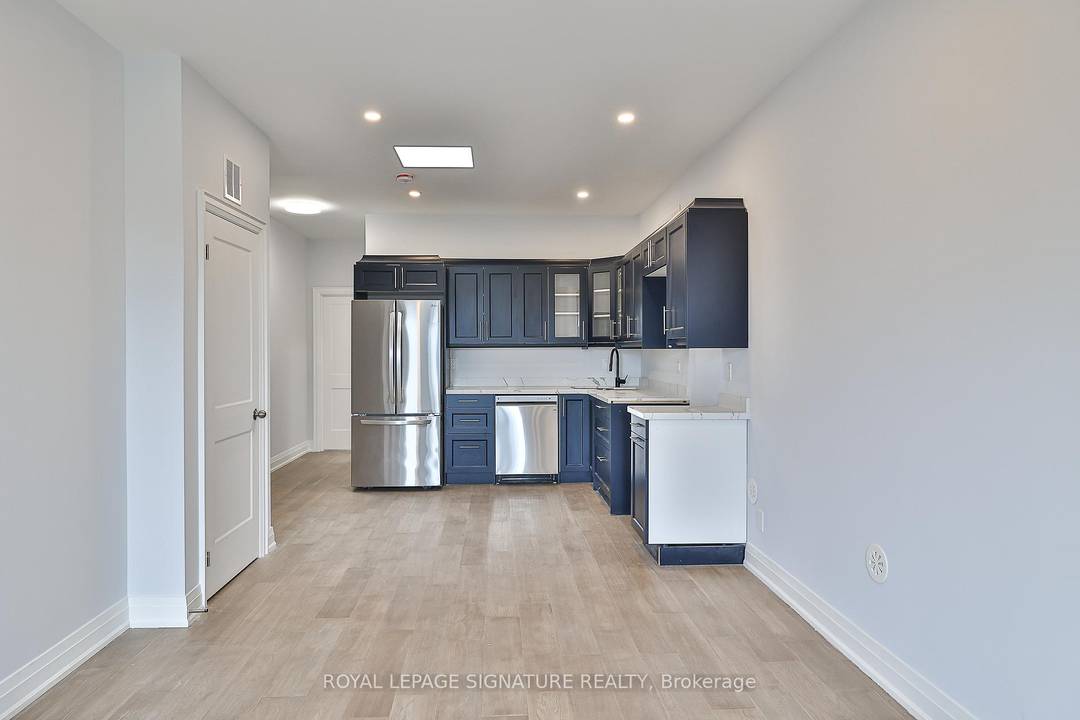Stunning, never lived in 1 bedroom, 1 bath unit, with custom cabinetry, quartz counters, Stainless steel appliances and beautiful engineered hardwood floors.