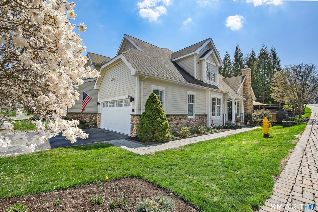 Experience the pinnacle of over 55 living in this meticulously updated Grand View end unit.