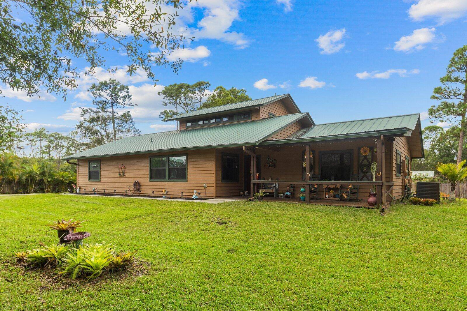 Discover peace and privacy at this beautifully maintained 3 bedroom, 2 bath home set on over 2 acres.